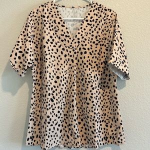 Woman’s animal print blouse